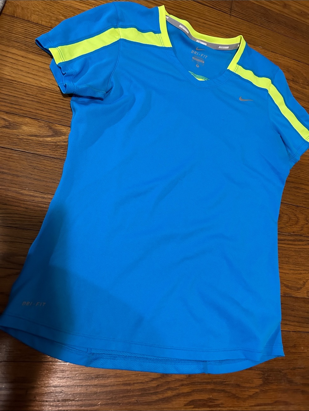 Nike Women's Blue Short Sleeve Dri-FIT Tee with Neon Yellow Accents